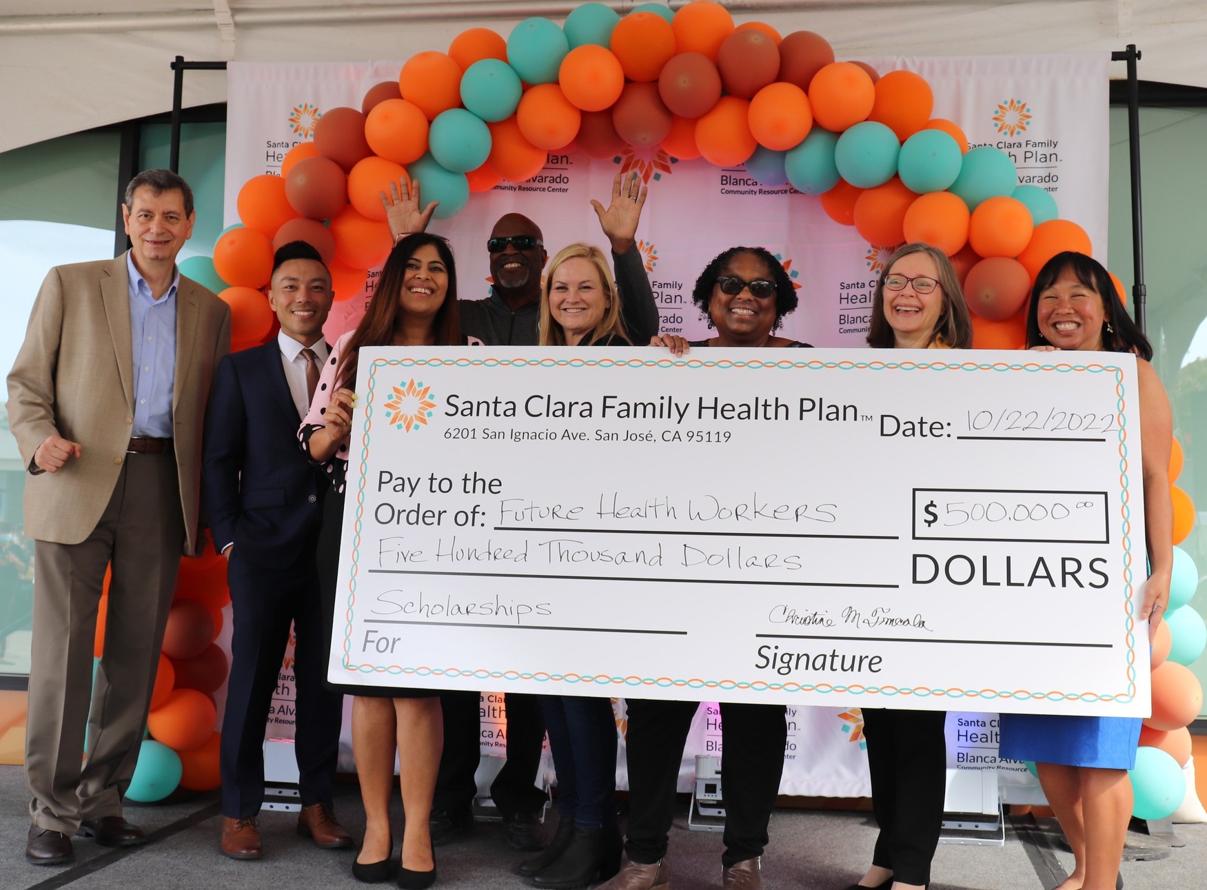 Santa Clara Family Health Plan Team Presents Big Check