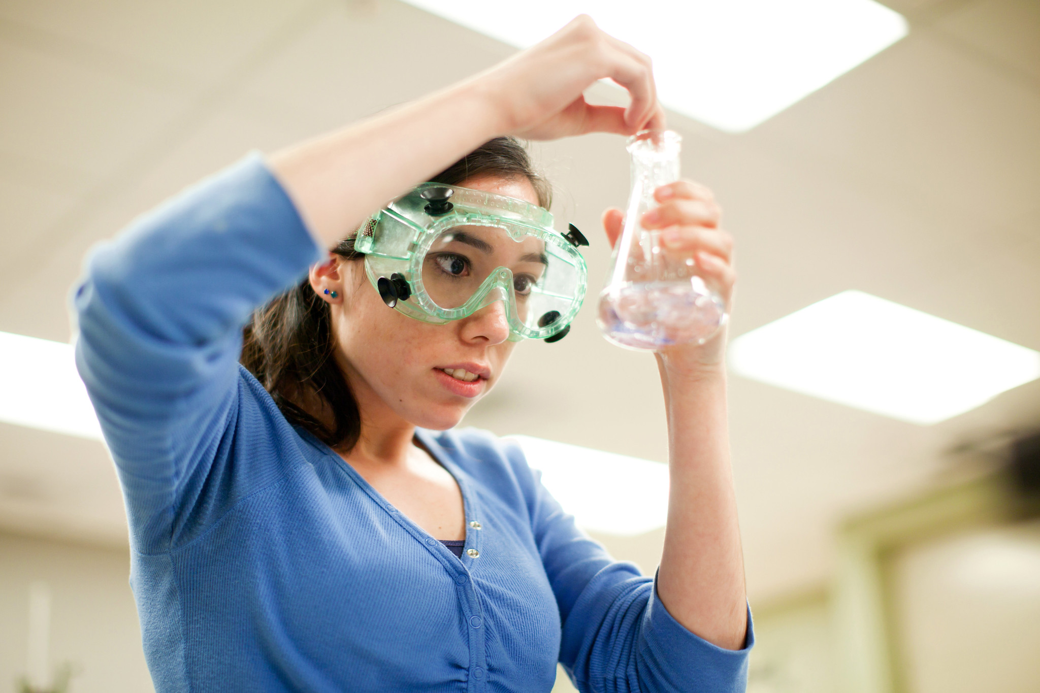 Female STEM student studying chemistry