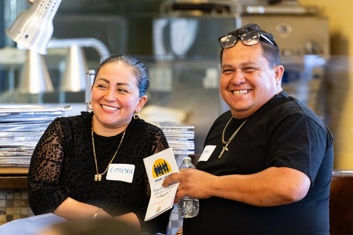 Parents smiling during event